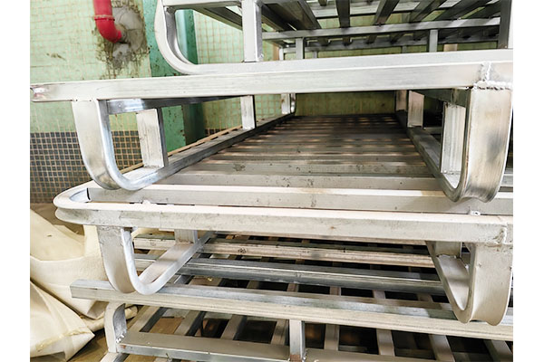 How compatible is the galvanized steel pallet in automated storage systems?